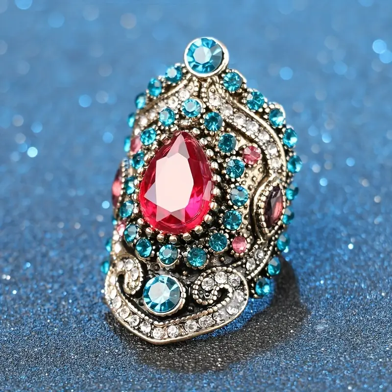 Asian-inspired ring with blue and red crystals
